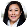 Portrait of a smiling Asian woman in a business suit