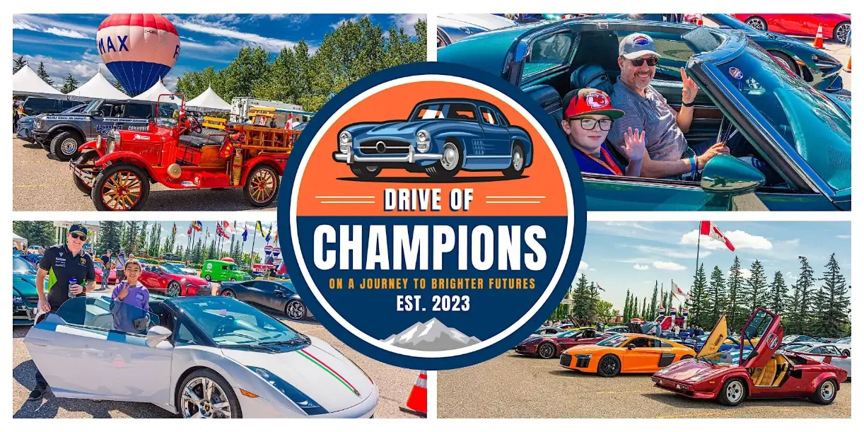 Drive of Champions car show featuring classic cars and modern sports cars.