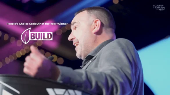 Man accepting People's Choice ScaleUP of the Year award for BUILD