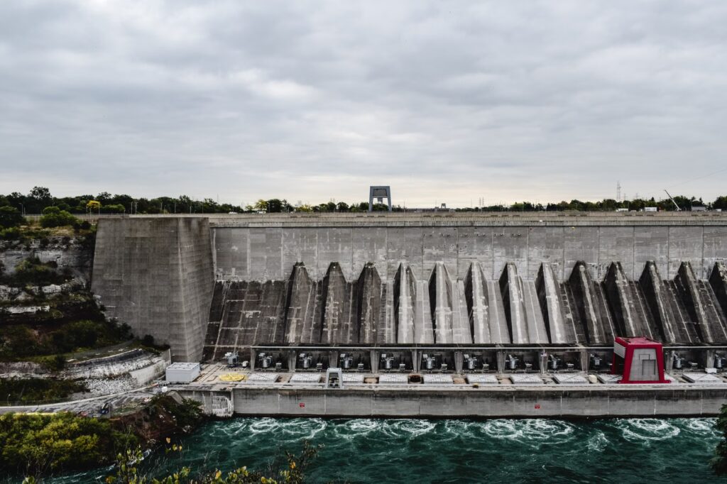 Aerial view of hydroelectric power plant at Niagara Falls, showcasing renewable energy.